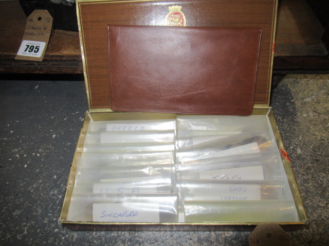 CIGAR BOX OF FOREIGN NOTES AND COINS Image