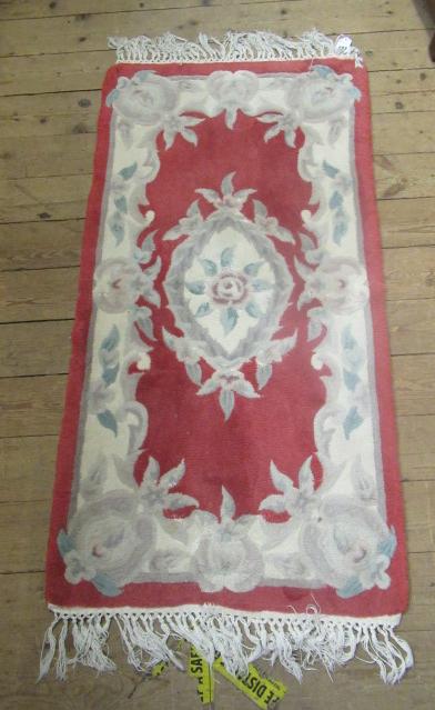SMALL RED AND CREAM RUG Image
