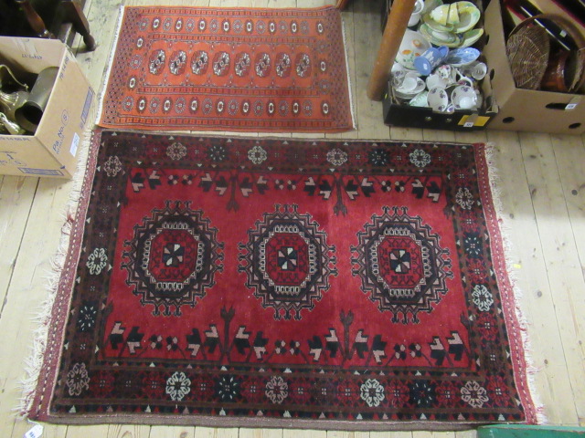 TWO RUGS Image