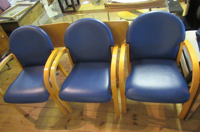 THREE BLUE UPHOLSTERED  ARM CHAIRS Image