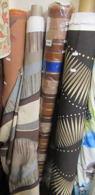 THREE ROLLS OF FABRIC Image