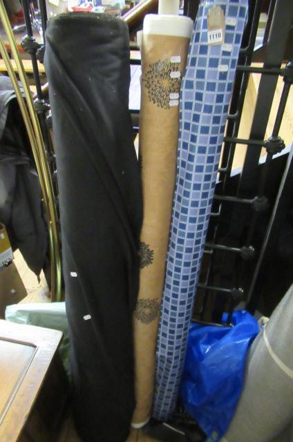 THREE ROLLS OF FABRIC Image