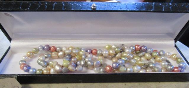 TWO PEARL NECKLACES WITH SILVER CLASPS Image