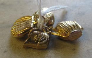 FOUR 9CT GOLD CHARMS Image