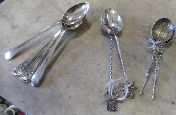 NINE SILVER NOVELTY TEASPOONS Image