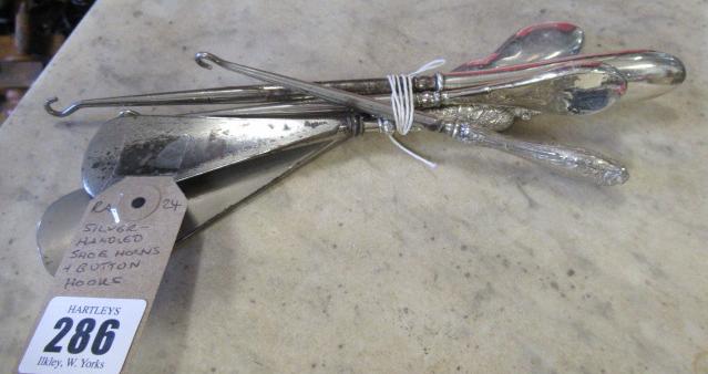 SILVER HANDLED SHOE HORNS AND BUTTON HOOKS Image