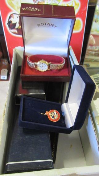 FOUR WATCHES AND A PIN BADGE Image