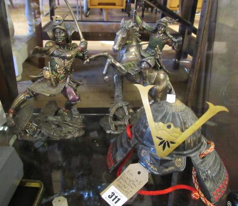 TWO SAMURAI FIGURES AND A HELMET Image