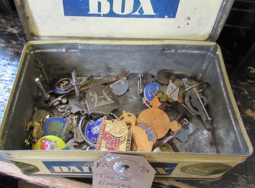 TIN OF BADGES Image