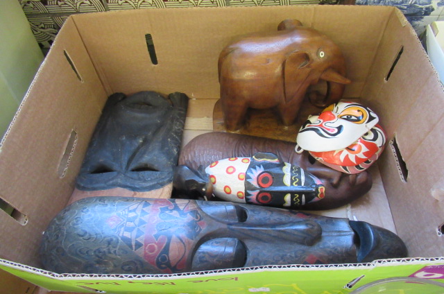 FOUR WOODEN AFRICAN MASKS TWO ELEPHANTS AND THREE ORIENTAL MASKS Image