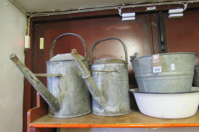 TWO WATERING CANS AND TWO OTHERS Image