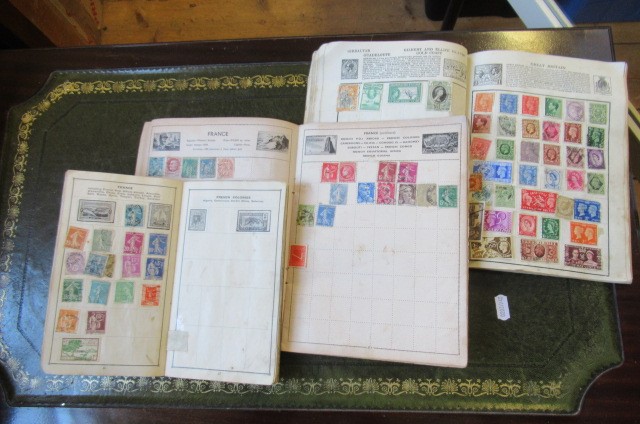 THREE ALBUMS OF WORLD STAMPS Image