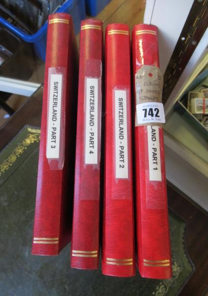 FOUR ALBUMS OF SWISS STAMPS Image