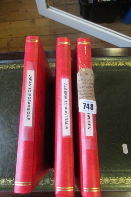 THREE ALBUMS OF WORLD STAMPS INCLUDING SWEDISH  ALGERIAN AND JAPANESE EXAMPLES Image