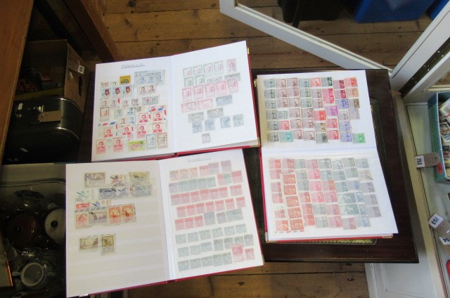 THREE ALBUMS OF WORLD STAMPS INCLUDING SWEDISH  ALGERIAN AND JAPANESE EXAMPLES Image