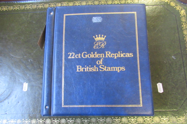 ALBUM OF 22CT GOLD PLATED REPLICA STAMPS Image