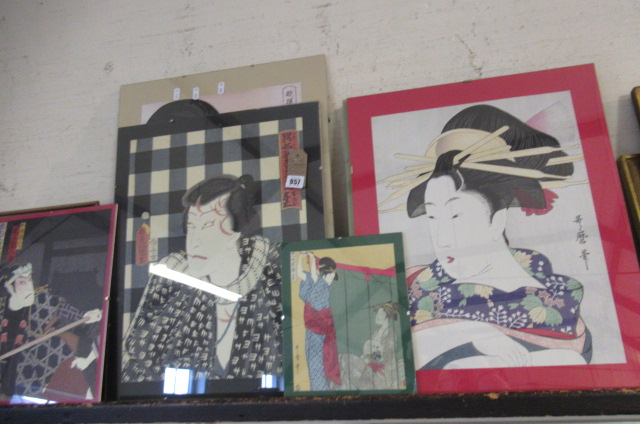 EIGHT JAPANESE WOODBLOCK PRINTS IN CLIP FRAMES Image