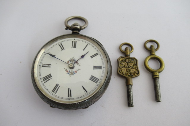 SILVER CASED POCKET WATCH AND KEYS Image