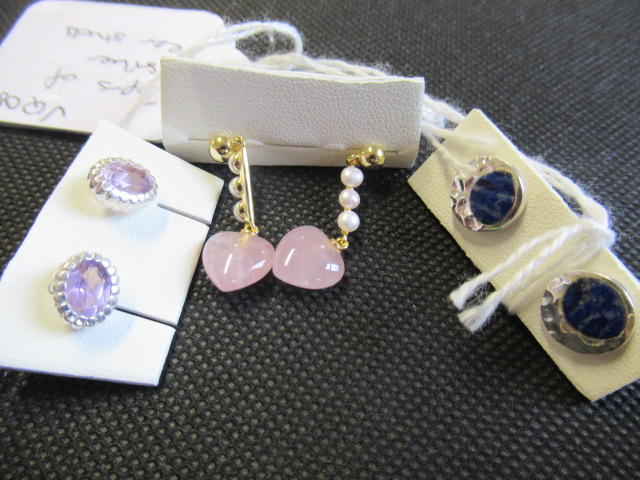 THREE PAIRS OF SILVER EAR STUDS Image