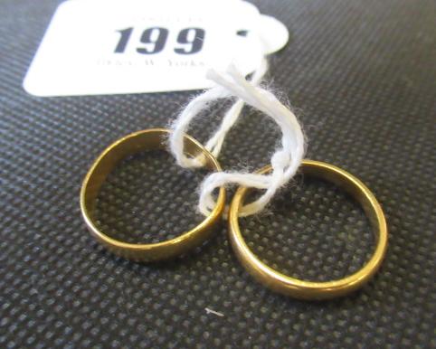 TWO 22CT GOLD WEDDING RINGS Image