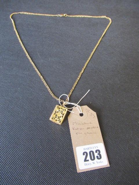 MINIATURE KORAN PENDANT ON CHAIN Image