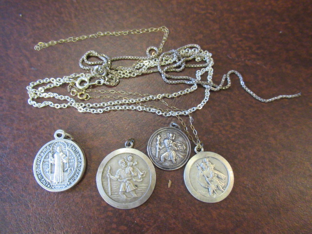 FOUR ST CHRISTOPHER PENDANTS AND CHAINS (SOME SILVER) Image