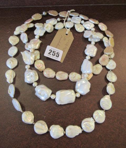 THREE NECKLACES Image