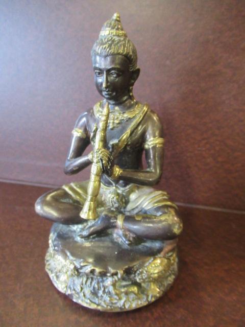 BRONZED DEITY Image