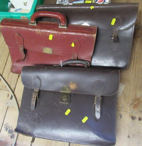 THREE VINTAGE LEATHER SUITCASES Image