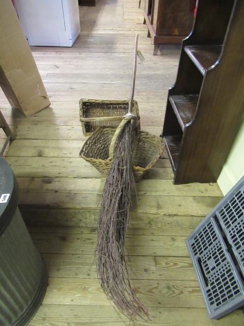 TWO WICKER BASKETS AND A BROOM Image