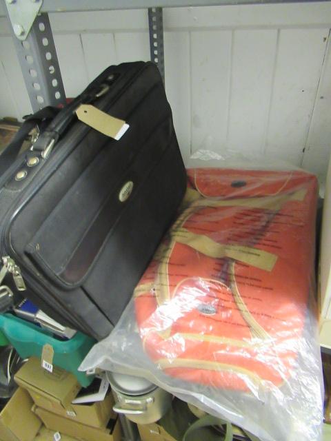 ORANGE TRAVEL BAG AND ANOTHER Image