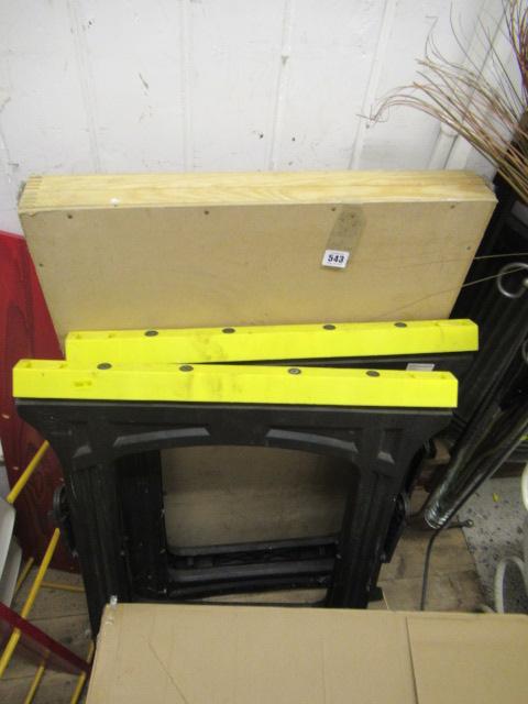 TWO TRESTLES AND A FOLDING PASTE TABLE Image