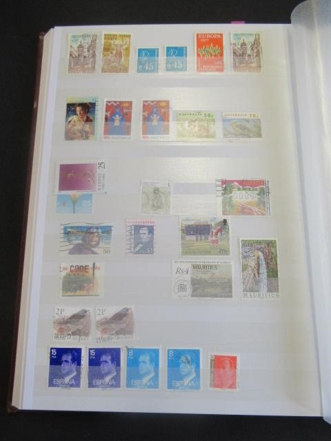 TWO ALBUMS OF VICTORIAN BRITISH AND WORLD STAMPS INCLUDING PENNY REDS Image