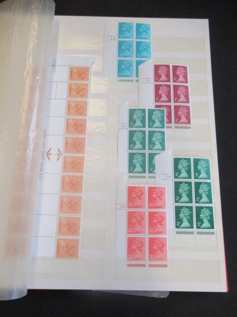 RED ALBUM OF MINT UK STAMPS INCLUDING HIGH VALUE EXAMPLES Image