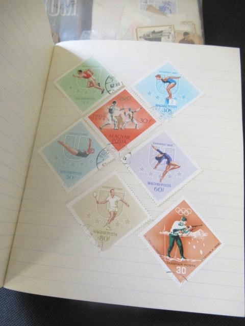THREE STAMP ALBUMS AND A FOLDER OF STAMPS Image