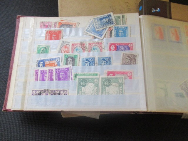 FOLDER AND TWO ALBUMS OF STAMPS Image