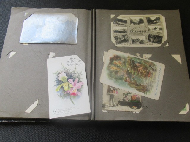 ALBUM OF VINTAGE POSTCARDS Image