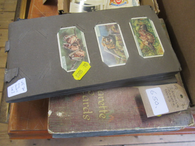 THREE ALBUMS OF CIGARETTE CARDS Image