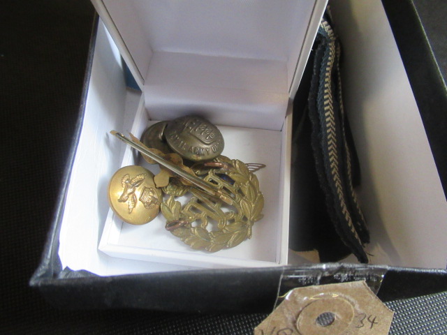BOX OF MILITARY INSIGNIA AND CAP BADGES ETC Image
