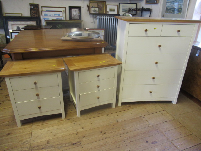 TWO BEDSIDE CABINETS AND A MATCHING CHEST OF DRAWERS Image