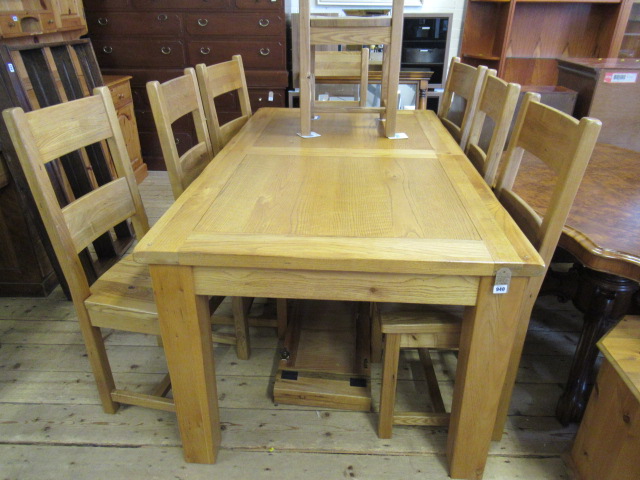 EXTENDING DINING TABLE AND EIGHT CHAIRS Image