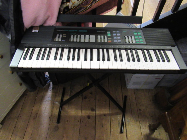 YAMAHA KEYBOARD AND STAND Image
