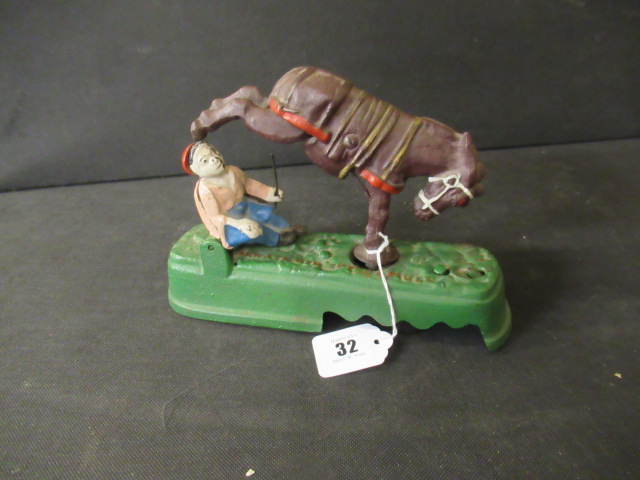VINTAGE METAL BUCKING MULE AND DOLL Image