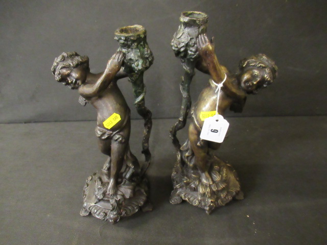 PAIR OF CAST METAL CHERUB CANDLESTICKS Image