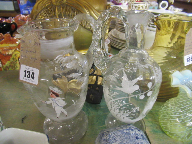 TWO PAINTED GLASS JUGS Image
