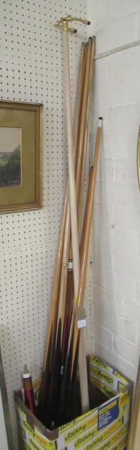 SEVEN SNOOKER CUES AND A SPIDER Image