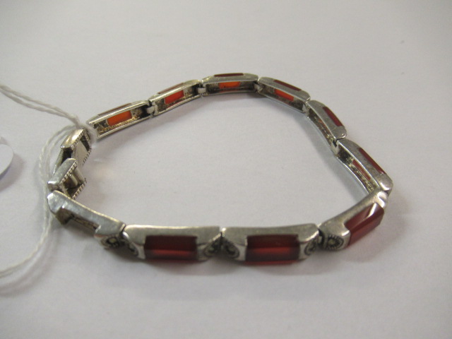 SILVER AND RED STONE BRACELET Image