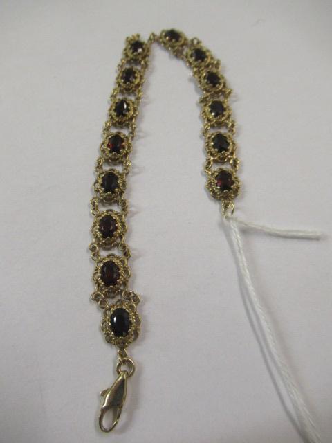 9CT GOLD AND RED STONE BRACELET - 12.3G GROSS Image