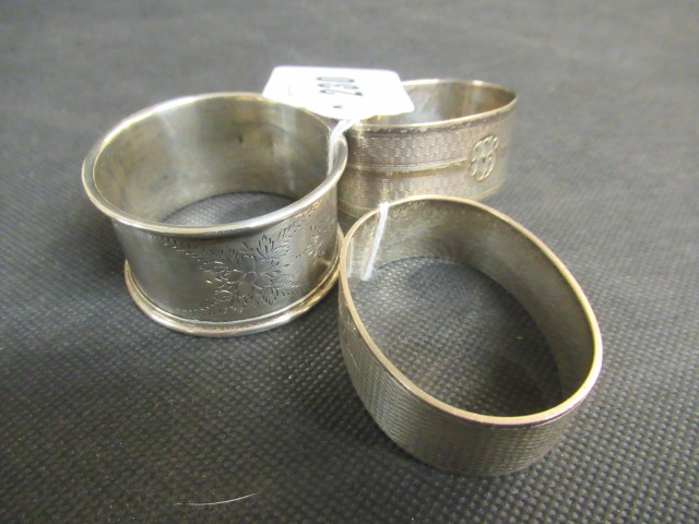 THREE SILVER NAPKIN RINGS - 56.6G TOTAL Image