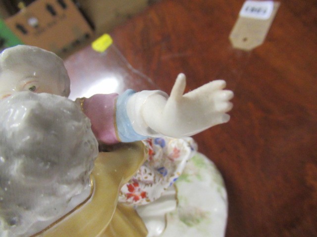 PORCELAIN GROUPING AND TWO OTHER FIGURES Image